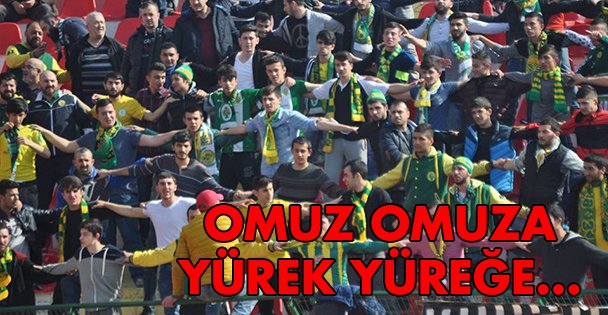 Omuz omuza yürek yüreğe