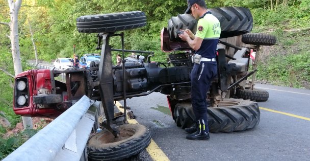 Yan yatan traktörün altında kalan sürücü ağır yaralandı